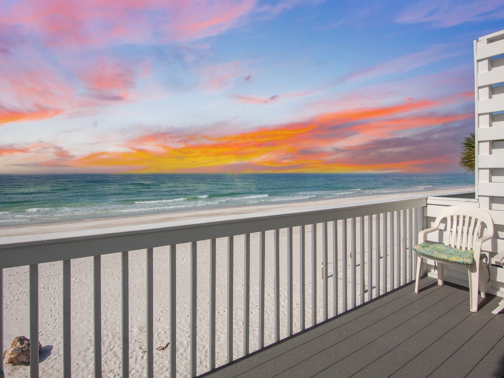Beachfront balcony with stunning sunset views