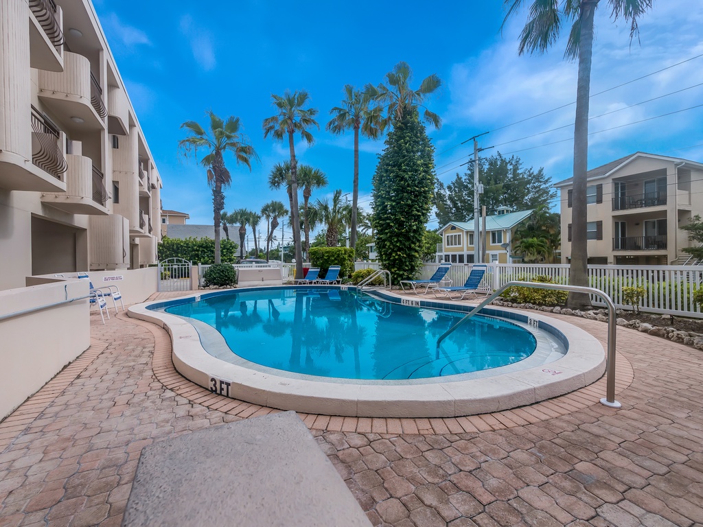 Community Pool with Lounge Chairs