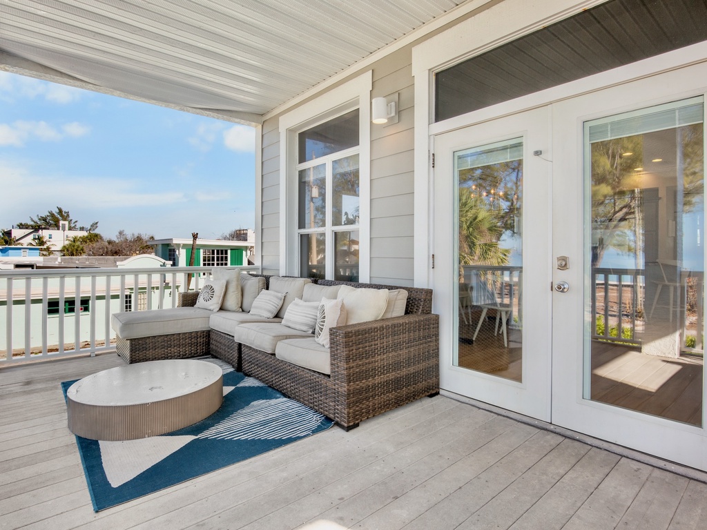 Private covered porch with seating