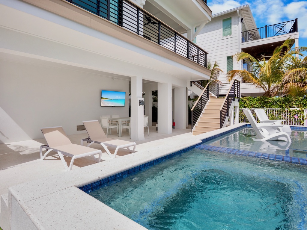 Private pool with covered lounge area