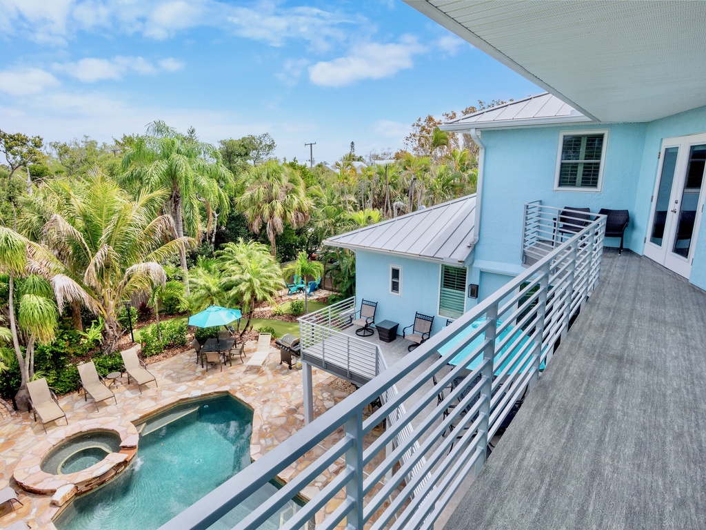 Balcony overlooking the pool and putting green