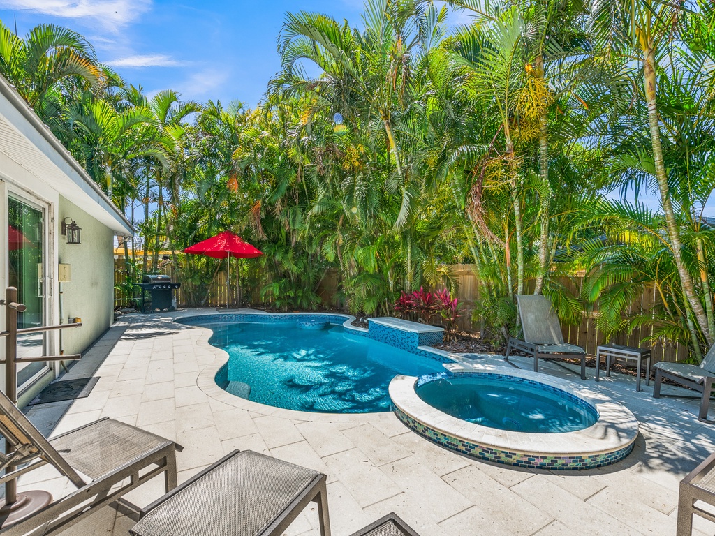 Private pool with sun loungers and BBQ grill