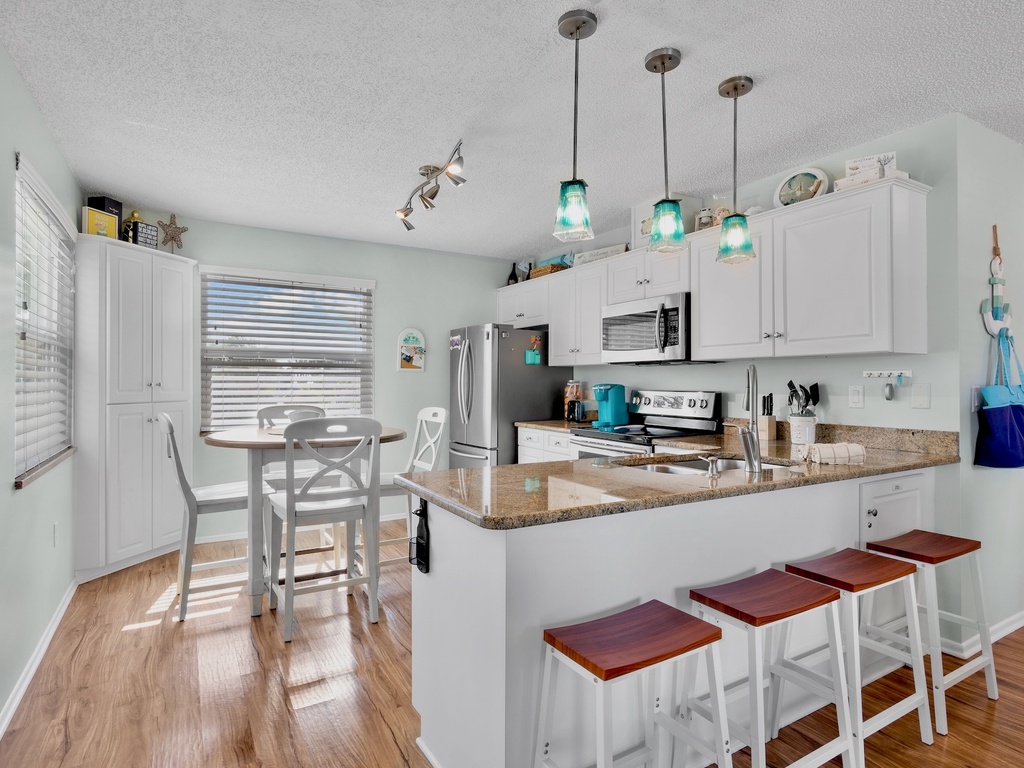 Open Kitchen with Island and Dining Table
