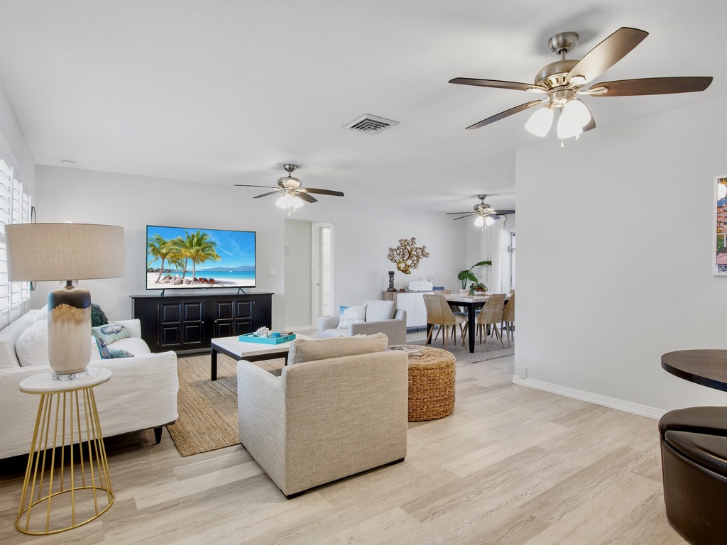 Living area with plush seating and TV