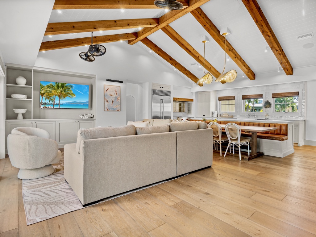 Open-concept living space, seamless flow into kitchen and dining