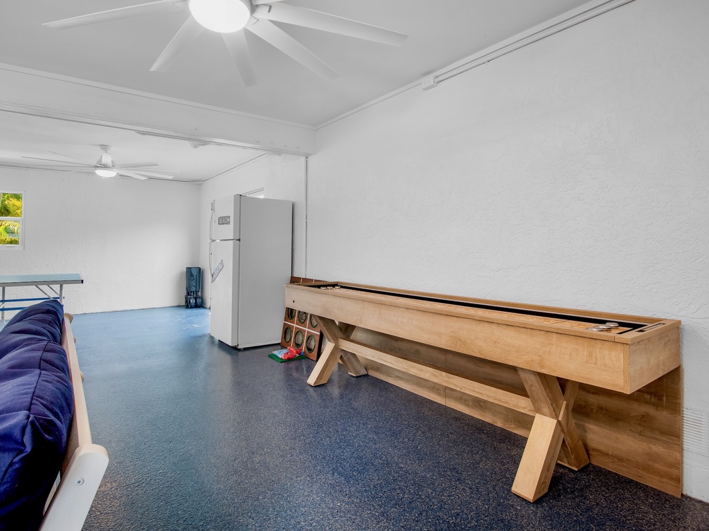 Game Room with Shuffleboard Table