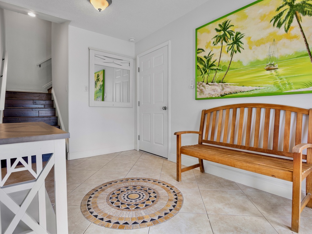 Welcoming entrance with indoor seating