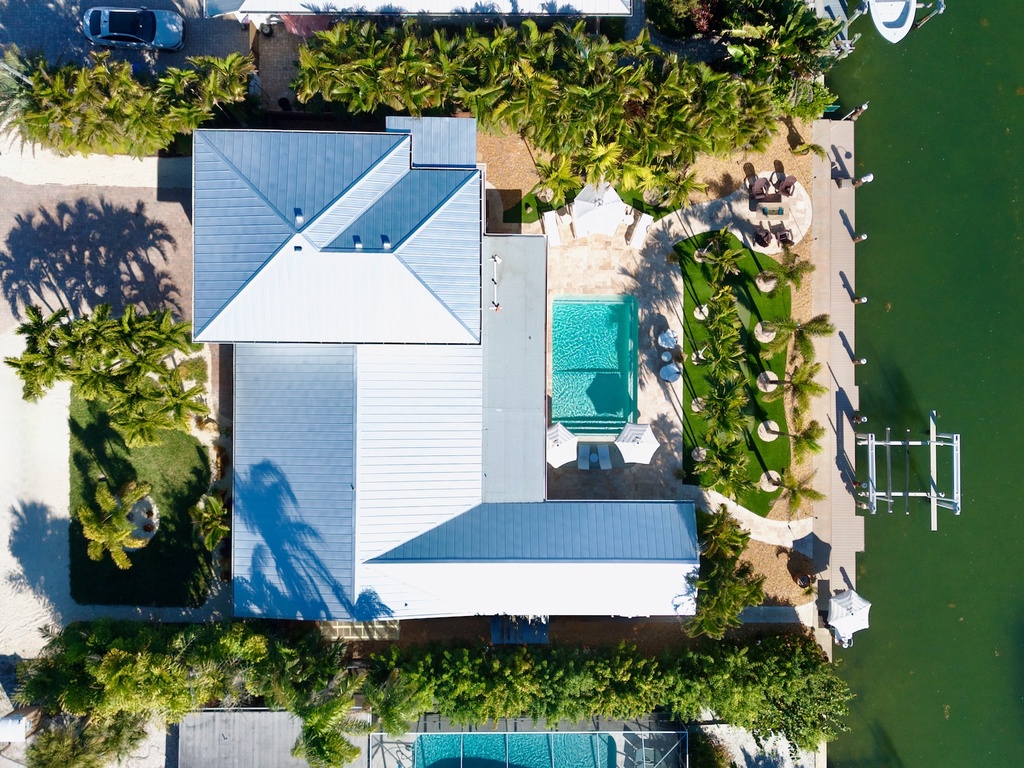 Waterfront home with pool and dock