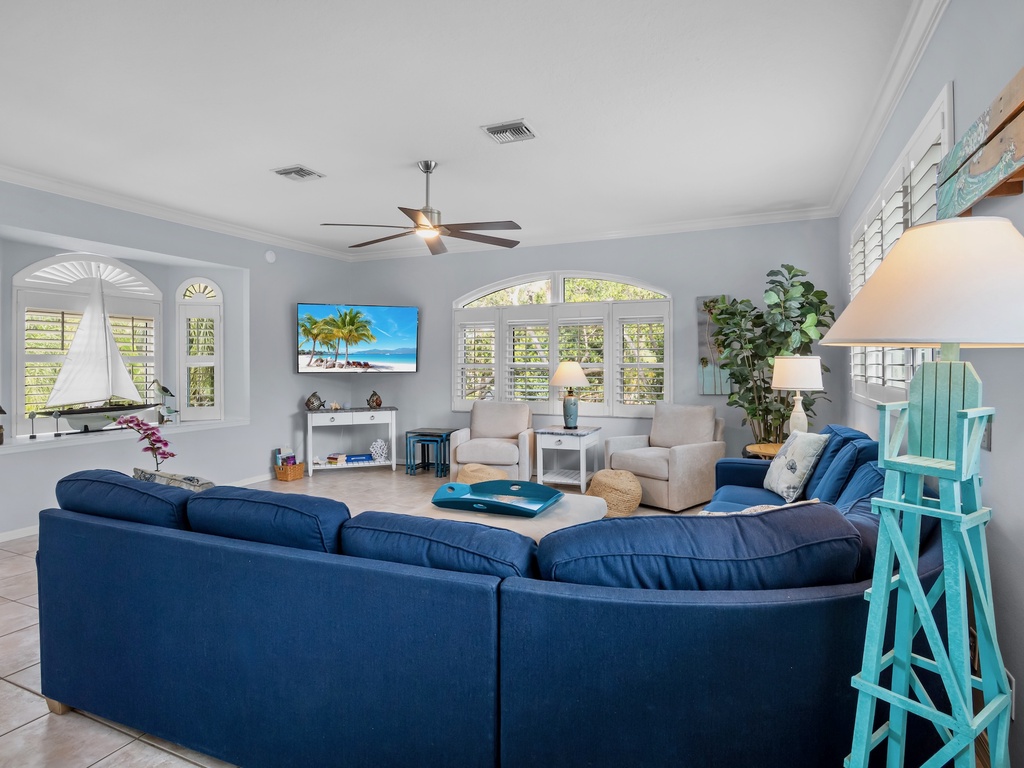 Living area with plush seating and TV