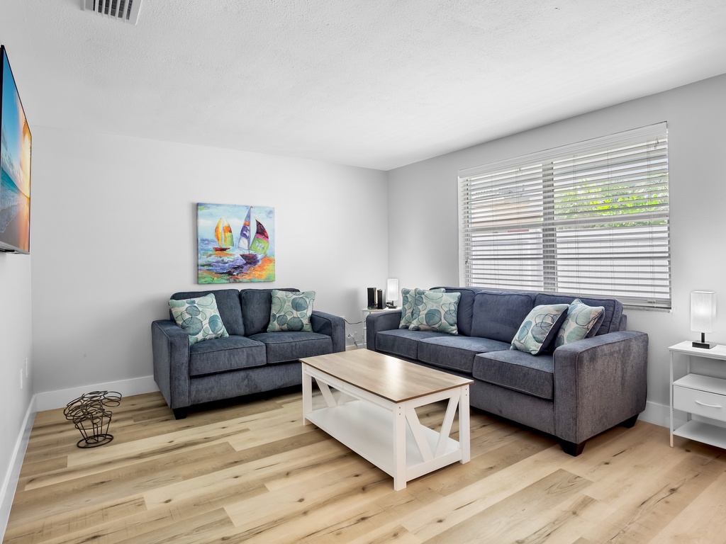 Bright and comfortable living room with plenty of space to relax.