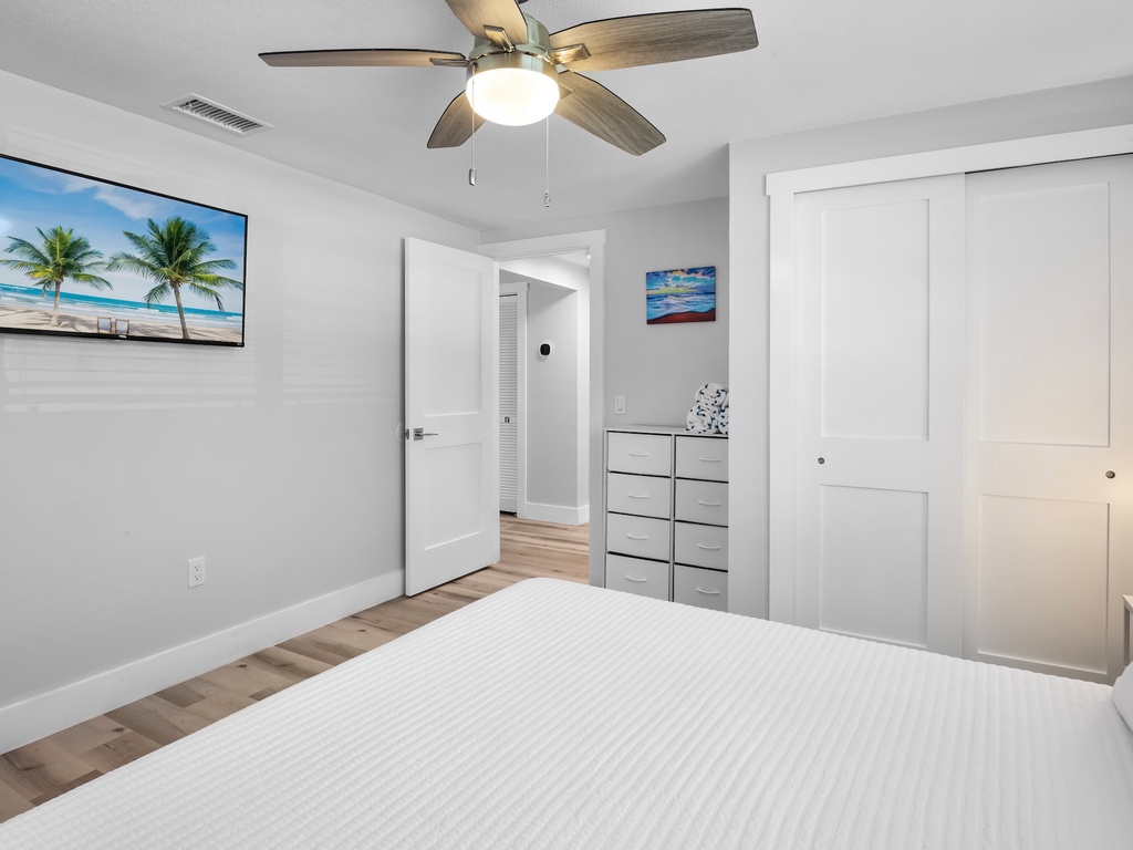 Relaxing primary bedroom retreat with king bed.