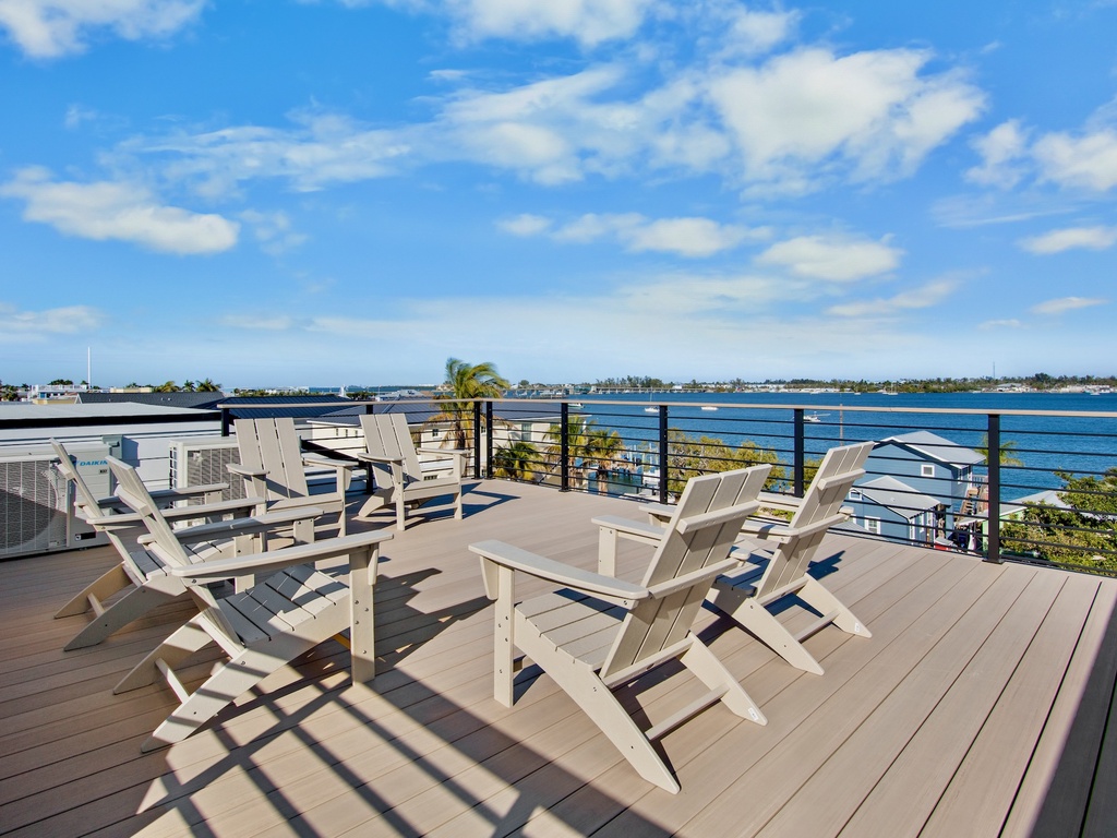 Rooftop deck with seating and views