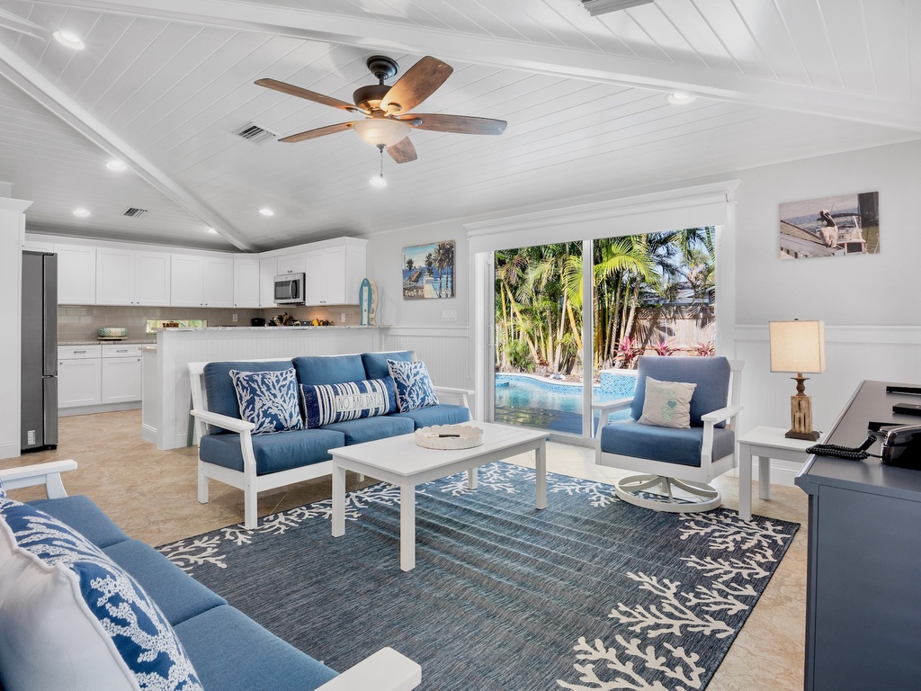 Living room with pool views