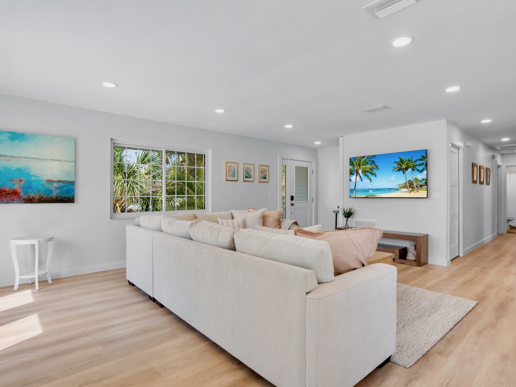Living area with plush seating and TV
