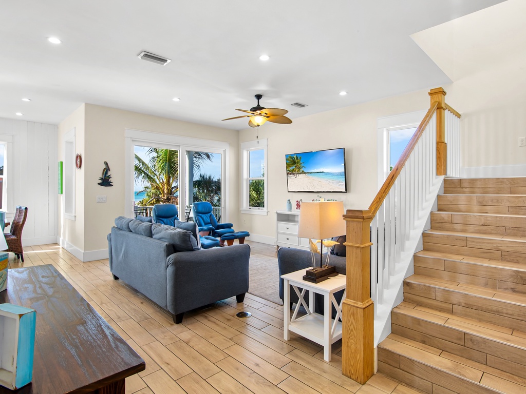 Living area with plush seating and TV