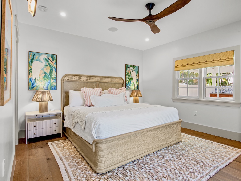 Primary bedroom with pool access, King bed