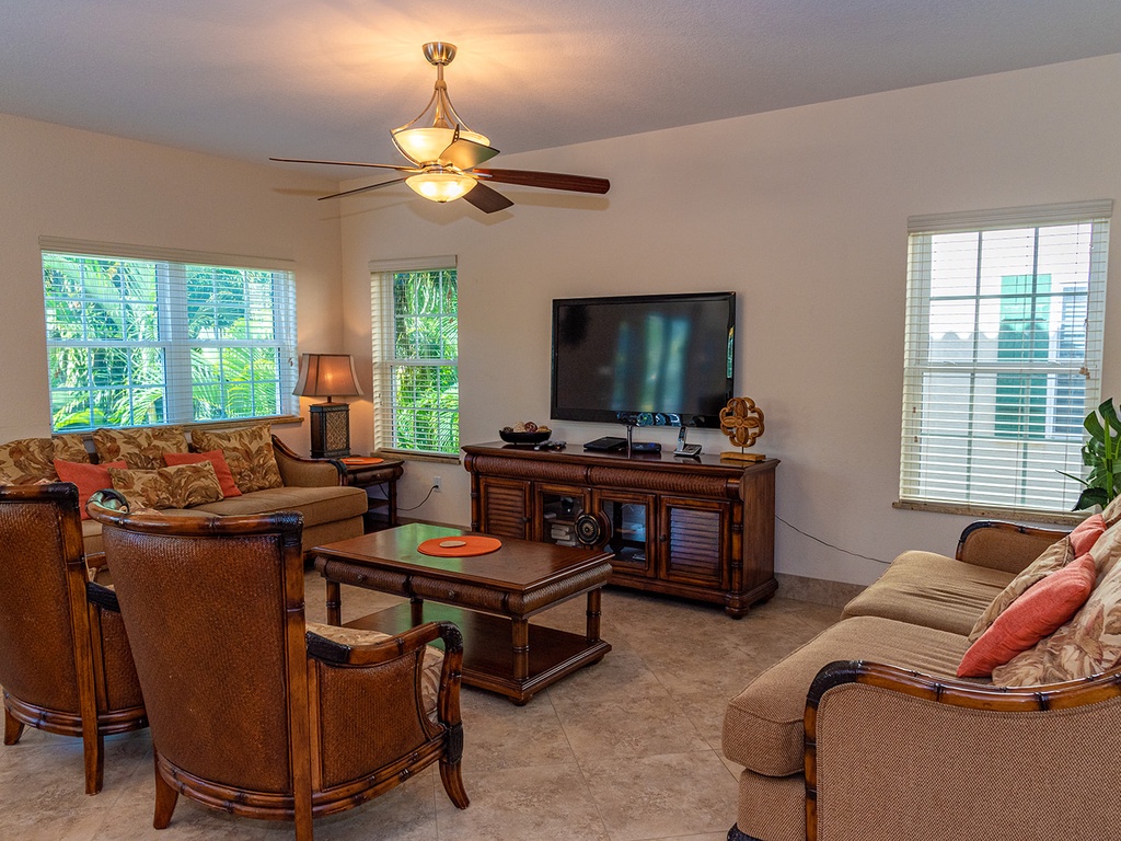 Main floor living area with Tommy Bahama furnishings