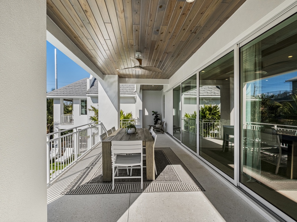 Private covered balcony with dining space