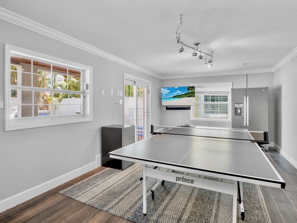 Game Room with Ping Pong, TV, and Refrigerator