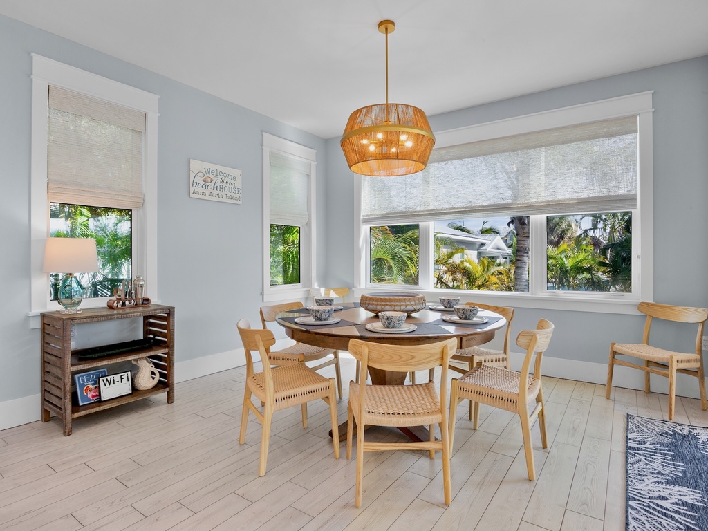 Elegant dining space a with tropical garden views