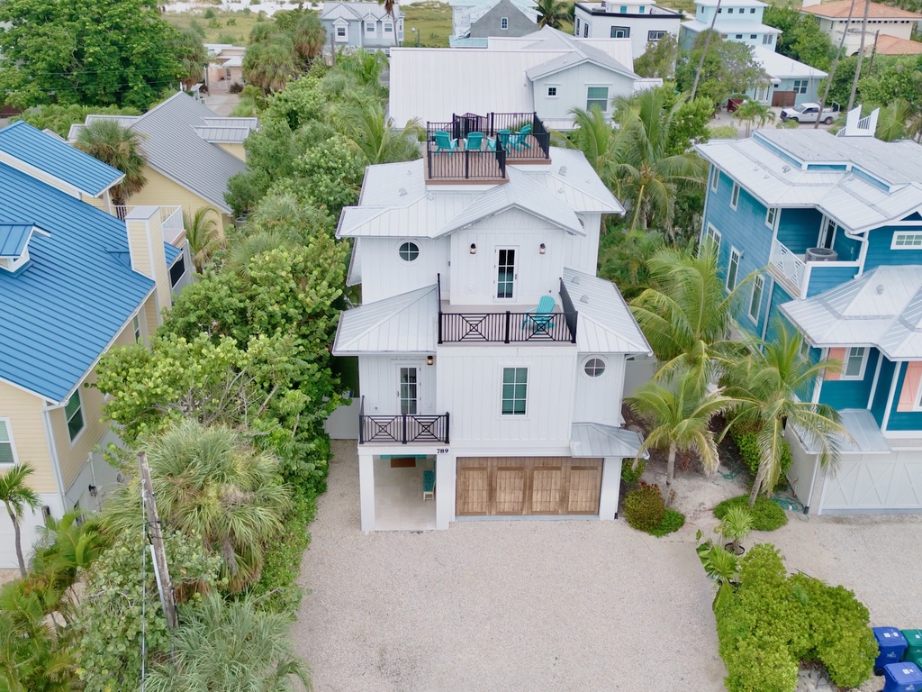Front of the home with lush landscaping