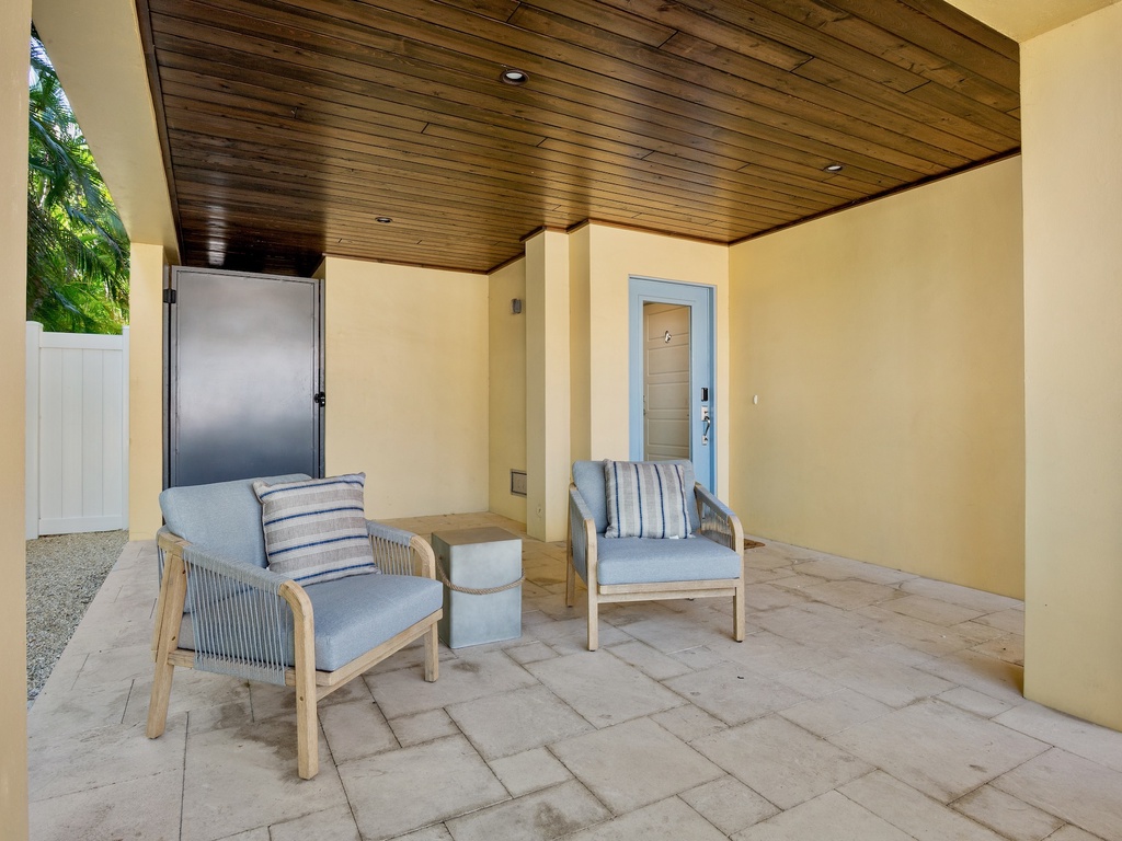 Covered outdoor lounge with comfortable seating