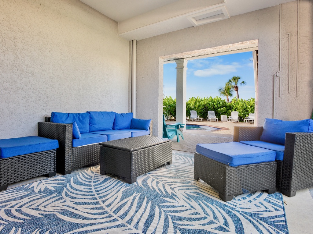 Private patio with covered lounge area