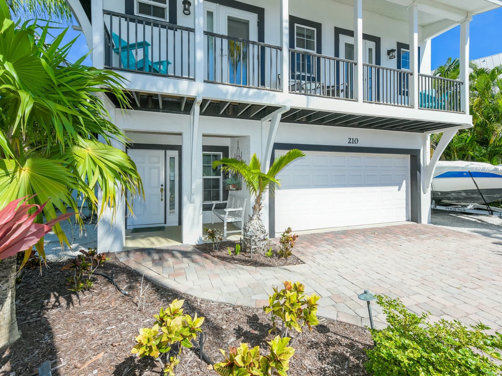 Beach and Boat House by AMI Locals