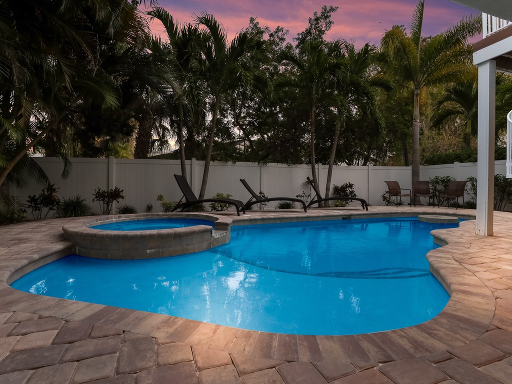 Private heated pool with swim-up table