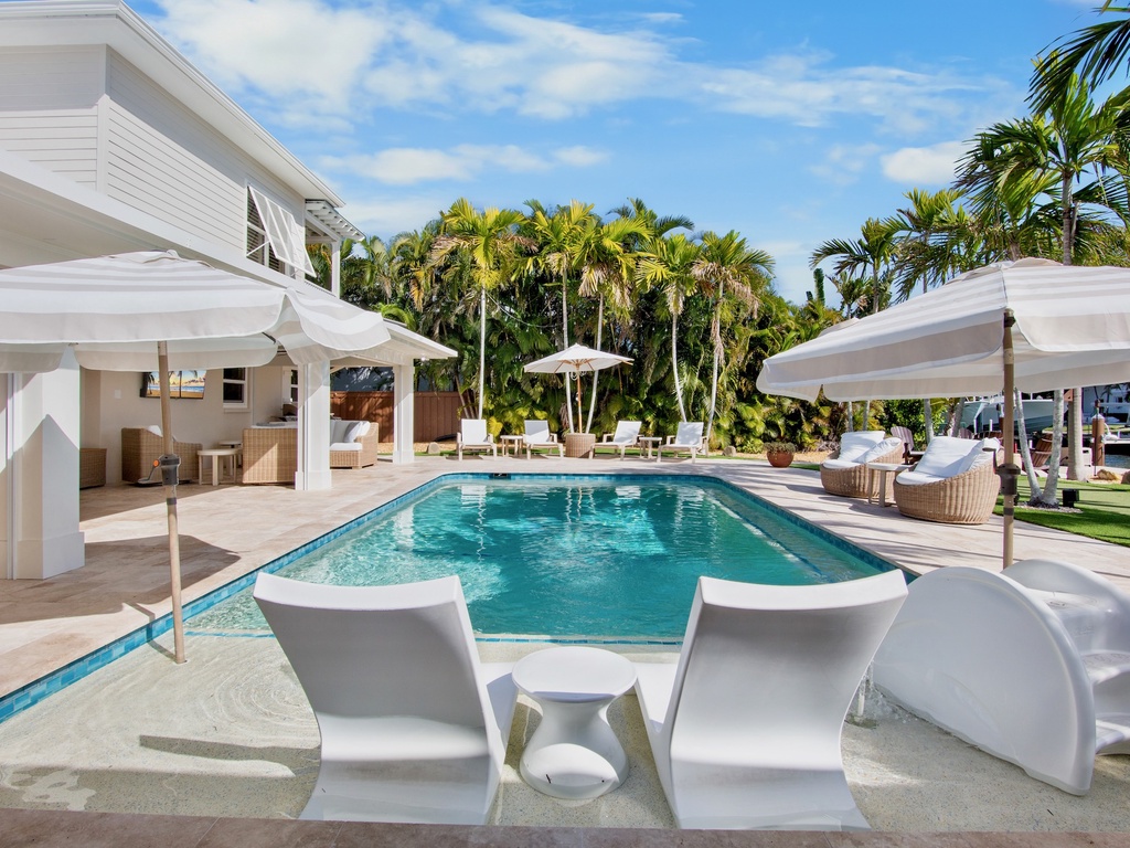 Private heated pool and outdoor lounge chairs