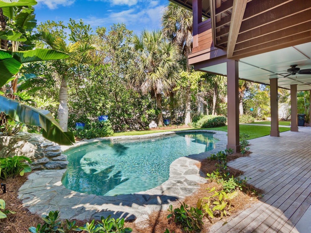 Private swimming pool and covered lounge