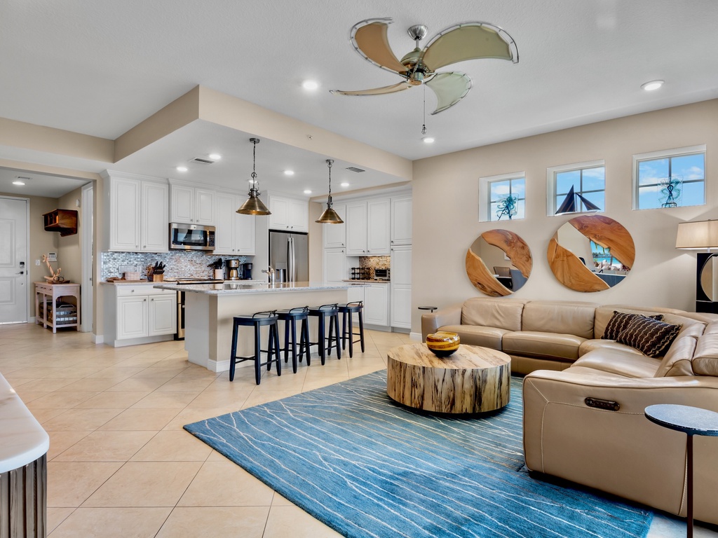 Open-concept kitchen and living area with island seating