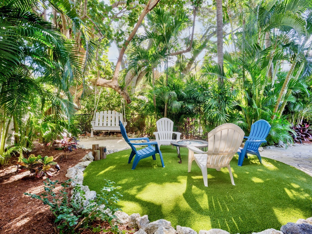 Tropical oasis with Adirondack chairs