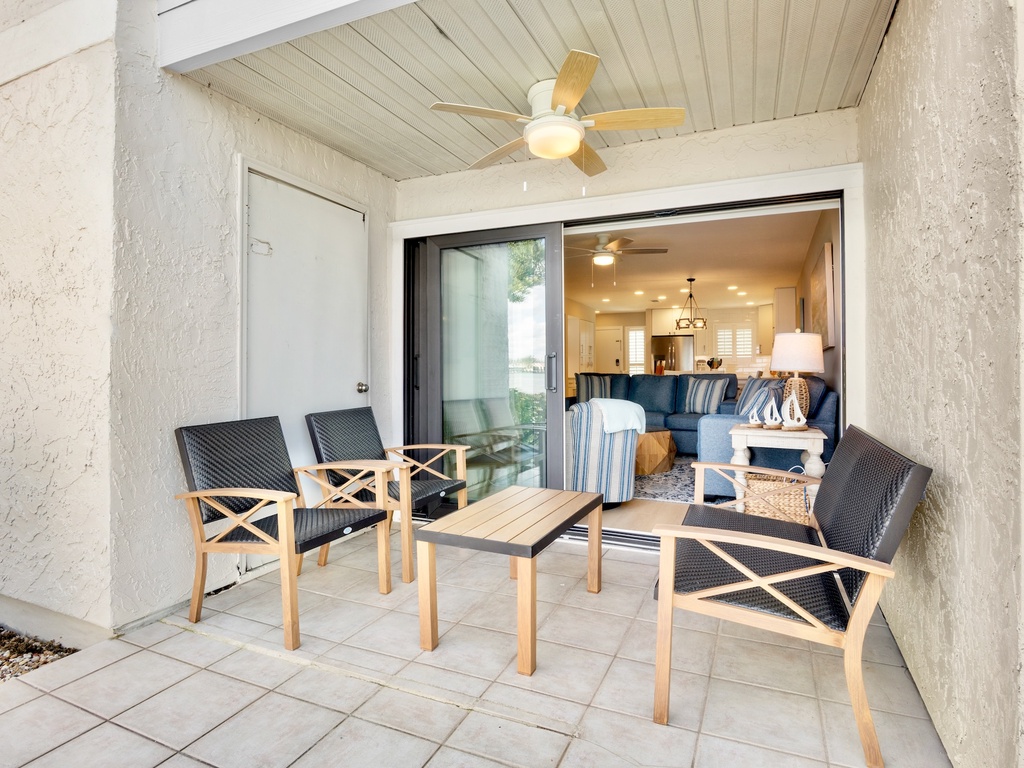 Private covered patio with outdoor seating