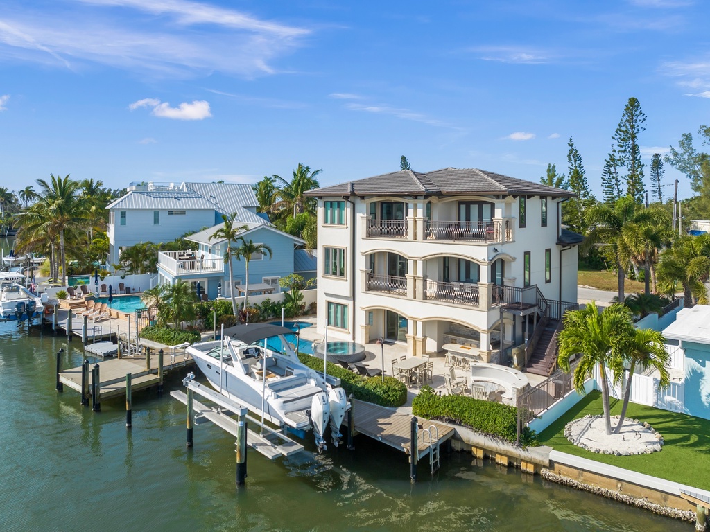 Waterfront property with private dock and boat access on canal waters