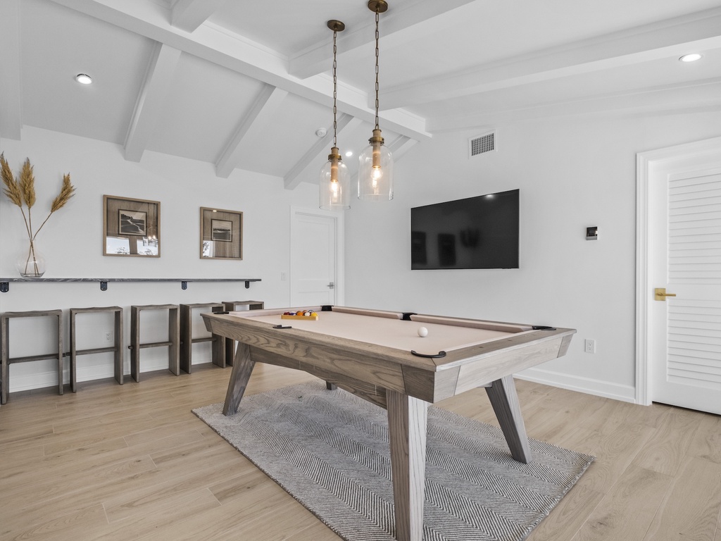 Indoor game room with pool table