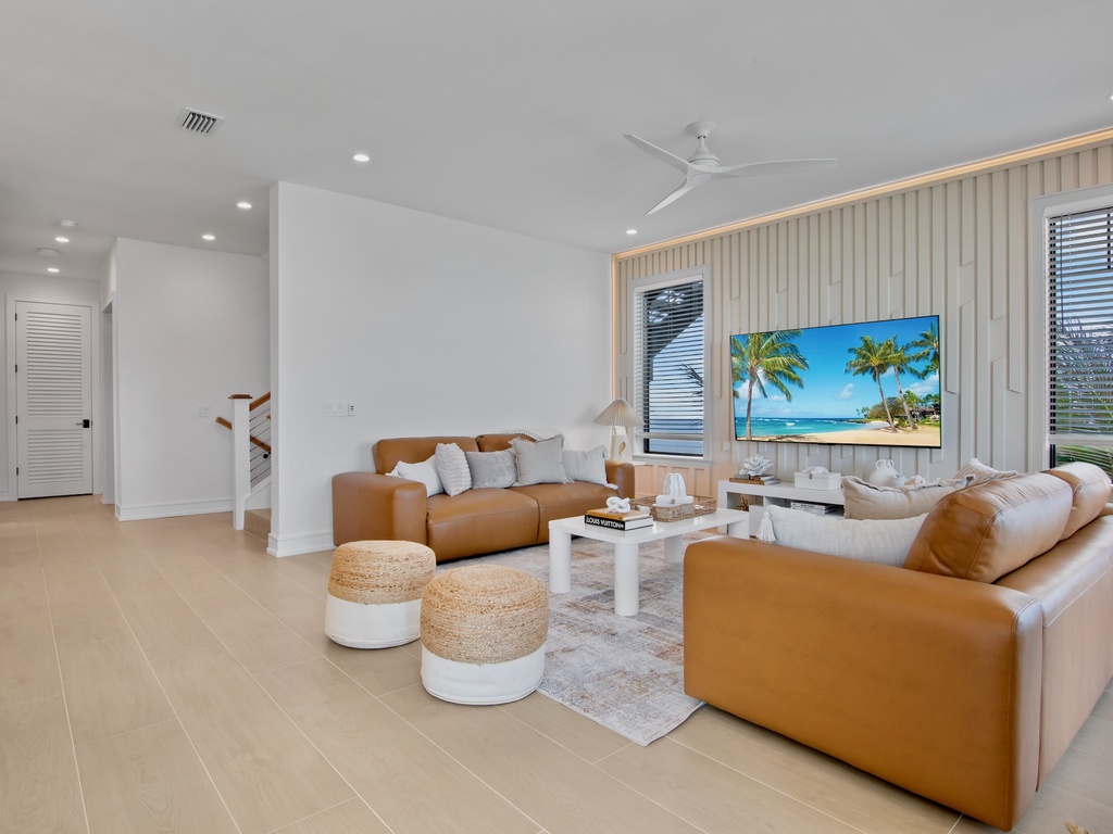 Living area with plush seating and TV