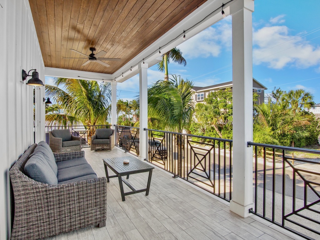 Private balcony with comfortable seating - 2nd floor