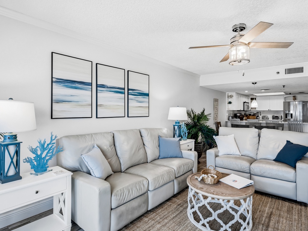 Relax in your bright living space with coastal touches and comfortable seating, where ocean-inspired decor creates a peaceful retreat.