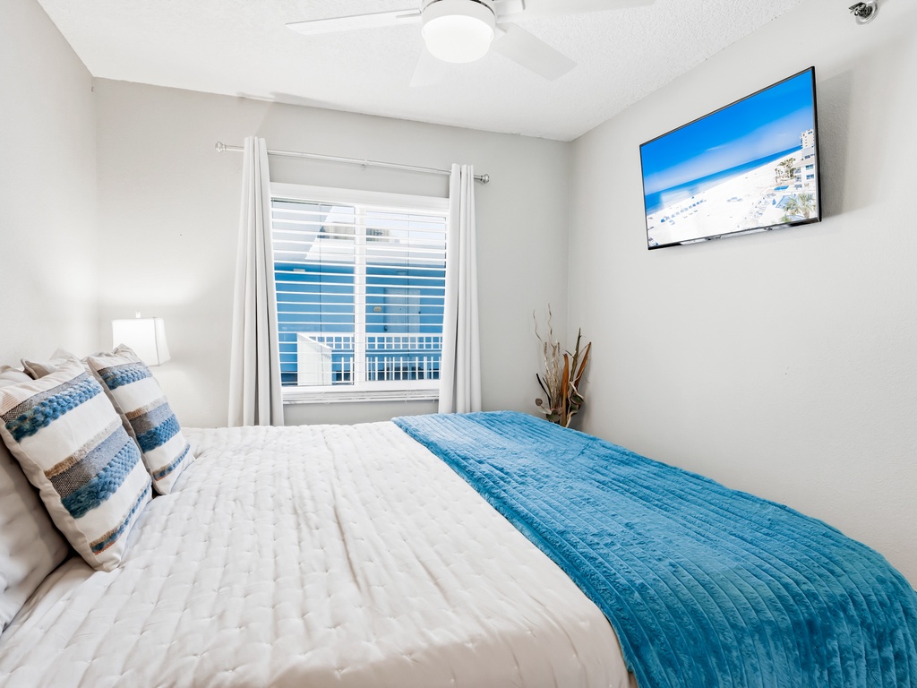 Drift off to sleep in your coastal-themed bedroom, where crisp linens and ocean-blue accents create a peaceful retreat after your beachside adventures.