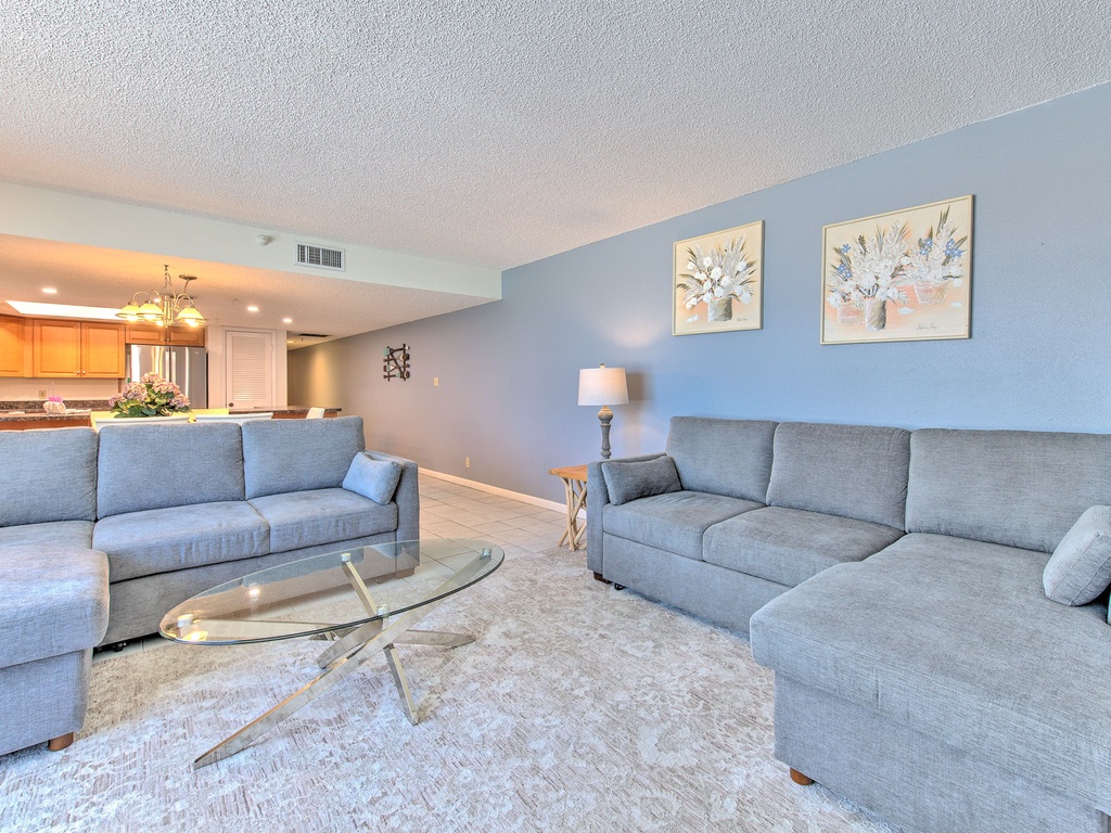 Relax in your spacious living room with plush sectional seating and open layout perfect for gathering with family and friends.