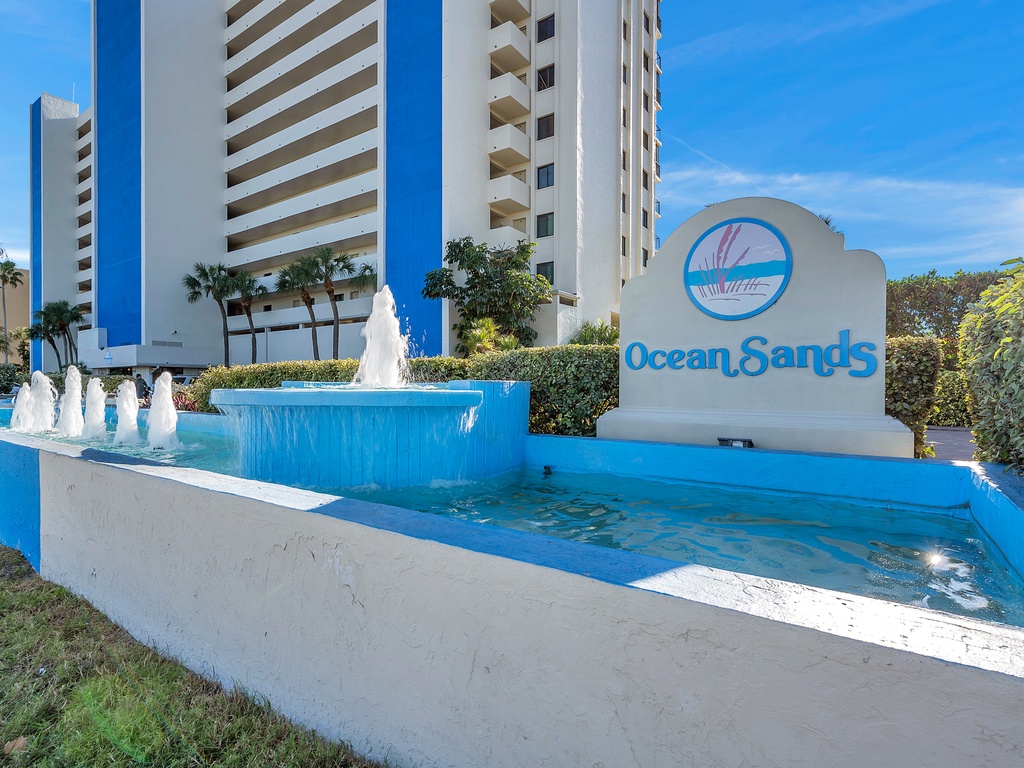 Ocean Sands resort entrance features an elegant fountain display marking your arrival at this beachside destination.