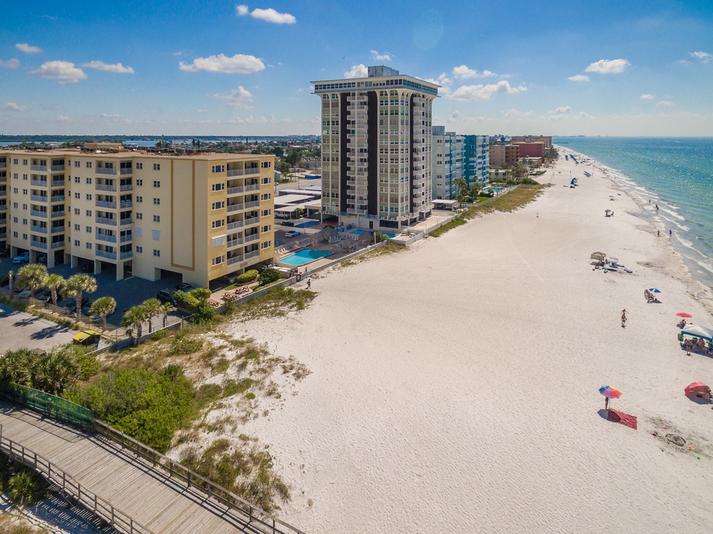 Beachfront property location with direct beach access and oceanfront accommodations along pristine sandy coastline.