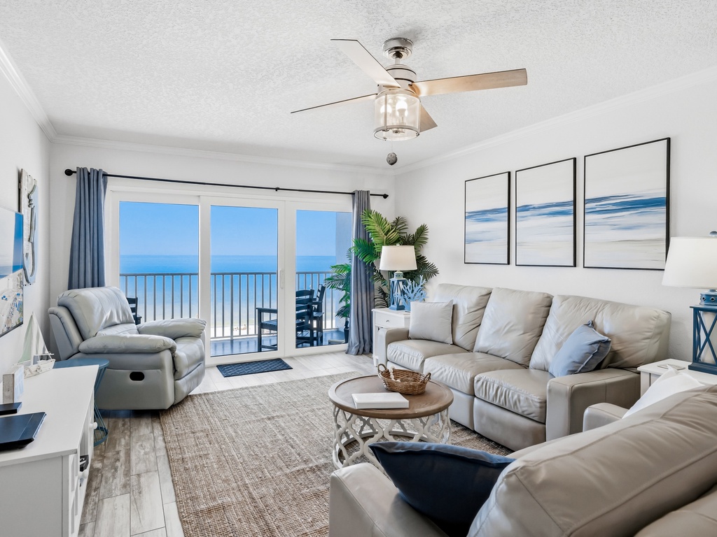 Unwind in your oceanfront living room where plush seating and stunning sea views create the perfect coastal retreat for relaxing.