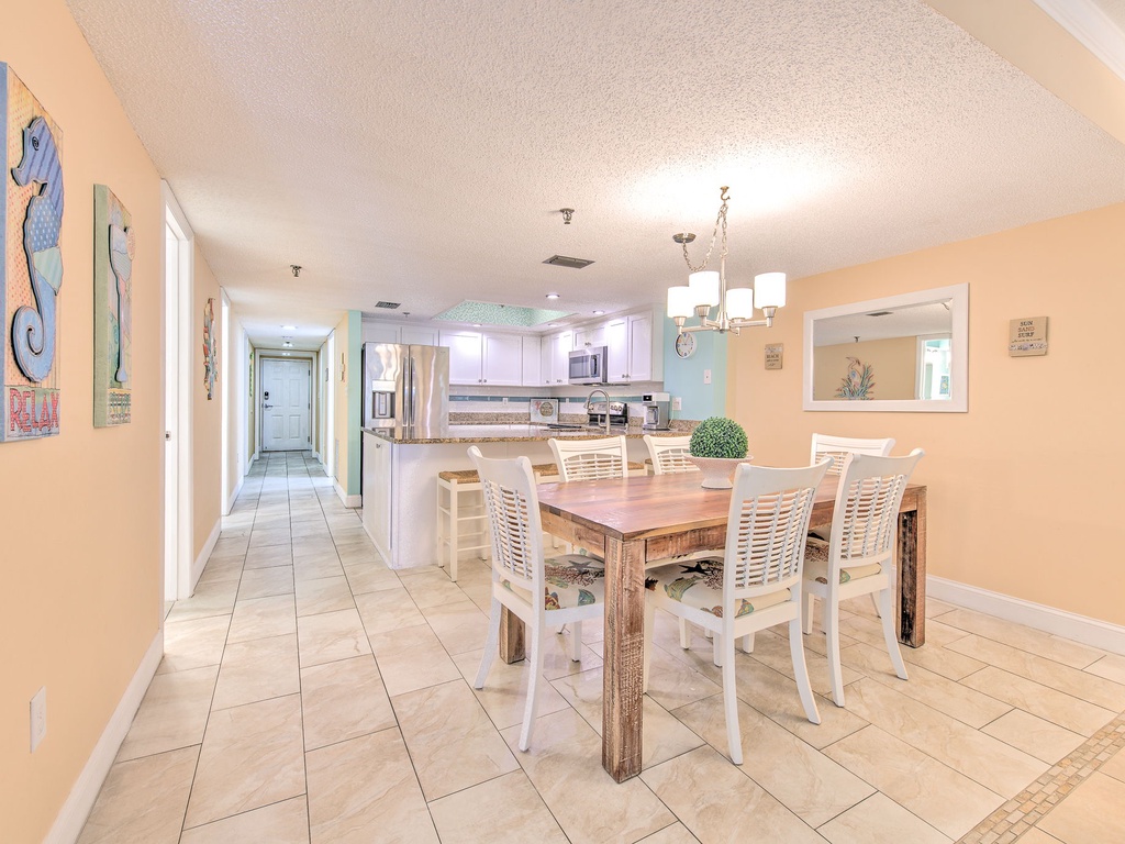 Gather around your beautiful dining table in this bright, open space that flows seamlessly into the modern kitchen.