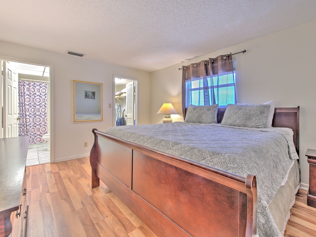 Sink into your comfortable sleigh bed surrounded by warm wood floors and peaceful natural light streaming through your windows.