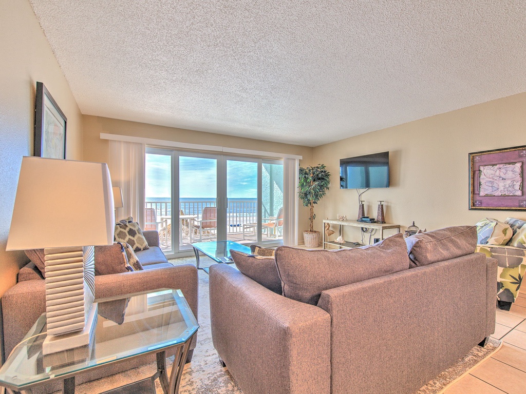 17-web-or-mls-JCResorts Ram Sea RS102 Living Room N Redington Shores-1