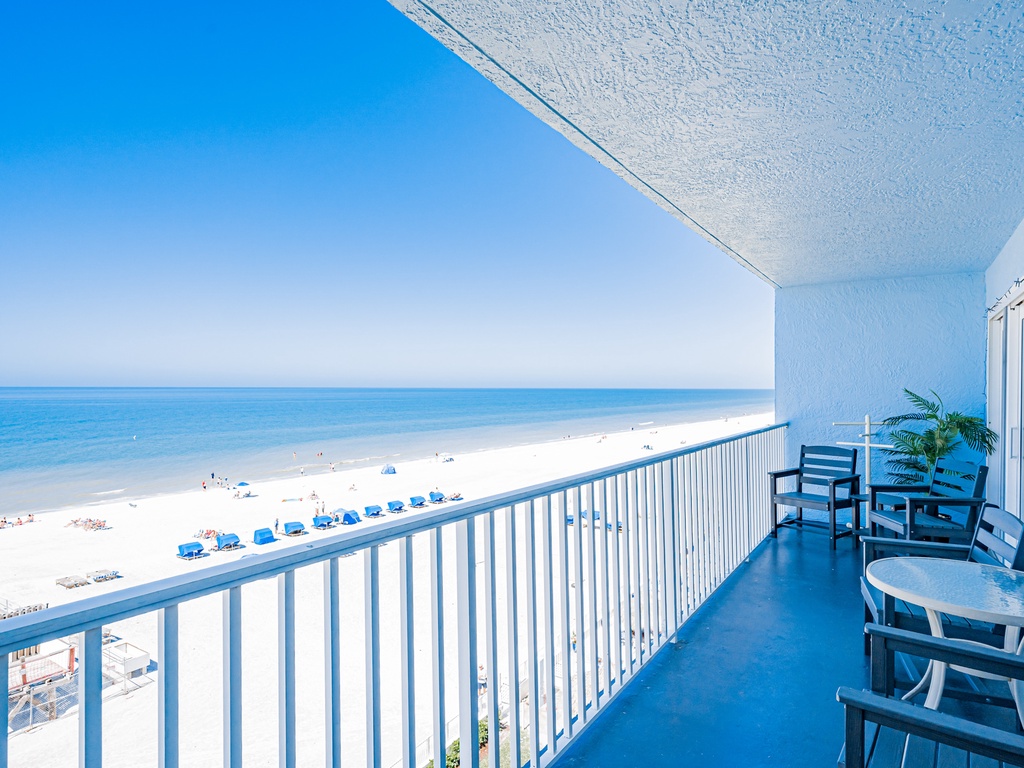 Step onto your private balcony and soak in breathtaking ocean views with pristine beach stretching endlessly below your seaside retreat.