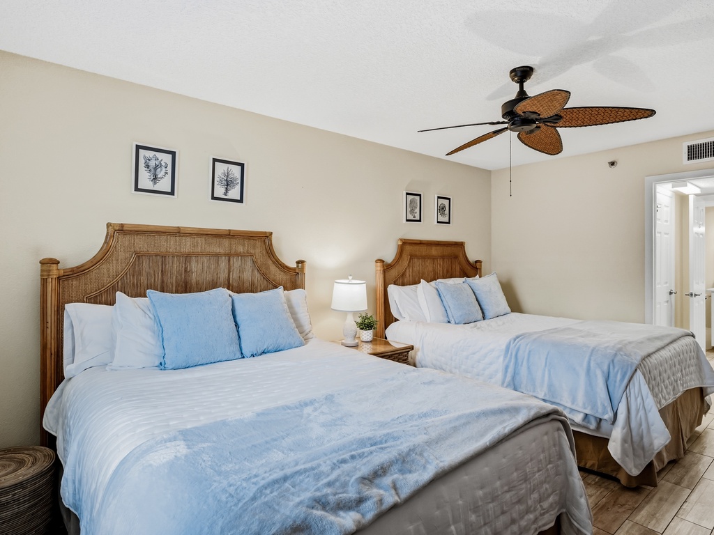 Rest peacefully in your twin beds with tropical wicker headboards and crisp linens under the gentle breeze of your ceiling fan.