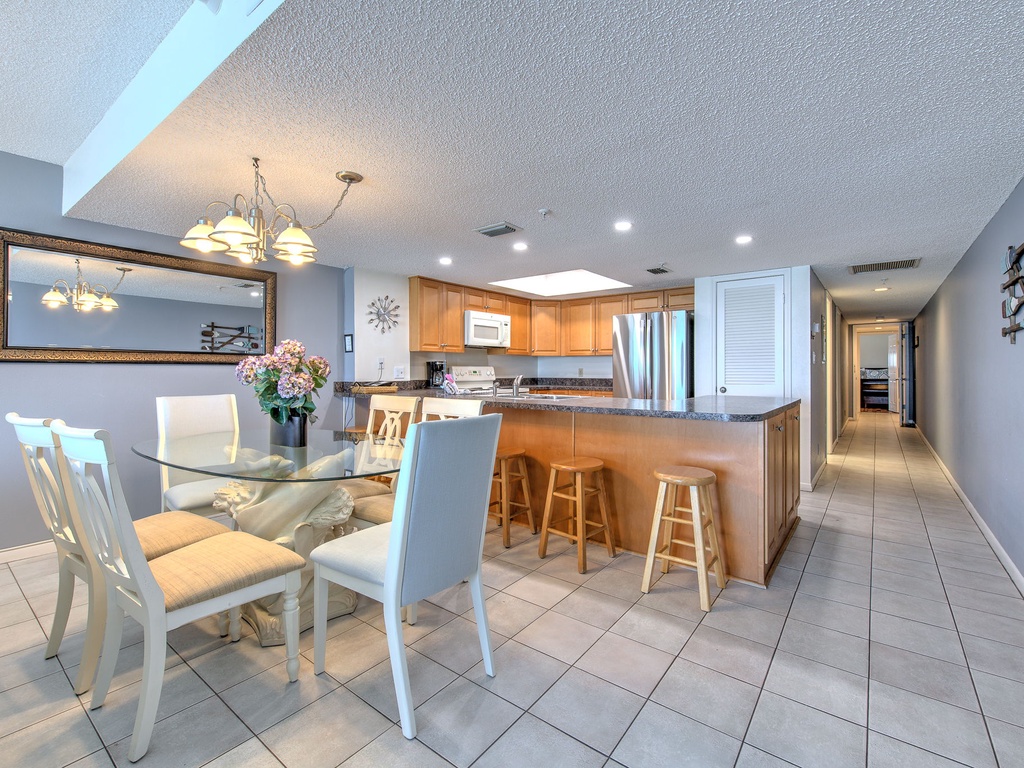 Gather around your spacious dining table for memorable meals, then chat at the breakfast bar while coffee brews in your fully-equipped kitchen.